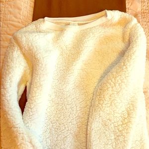 Very thick and fluffy sweater.